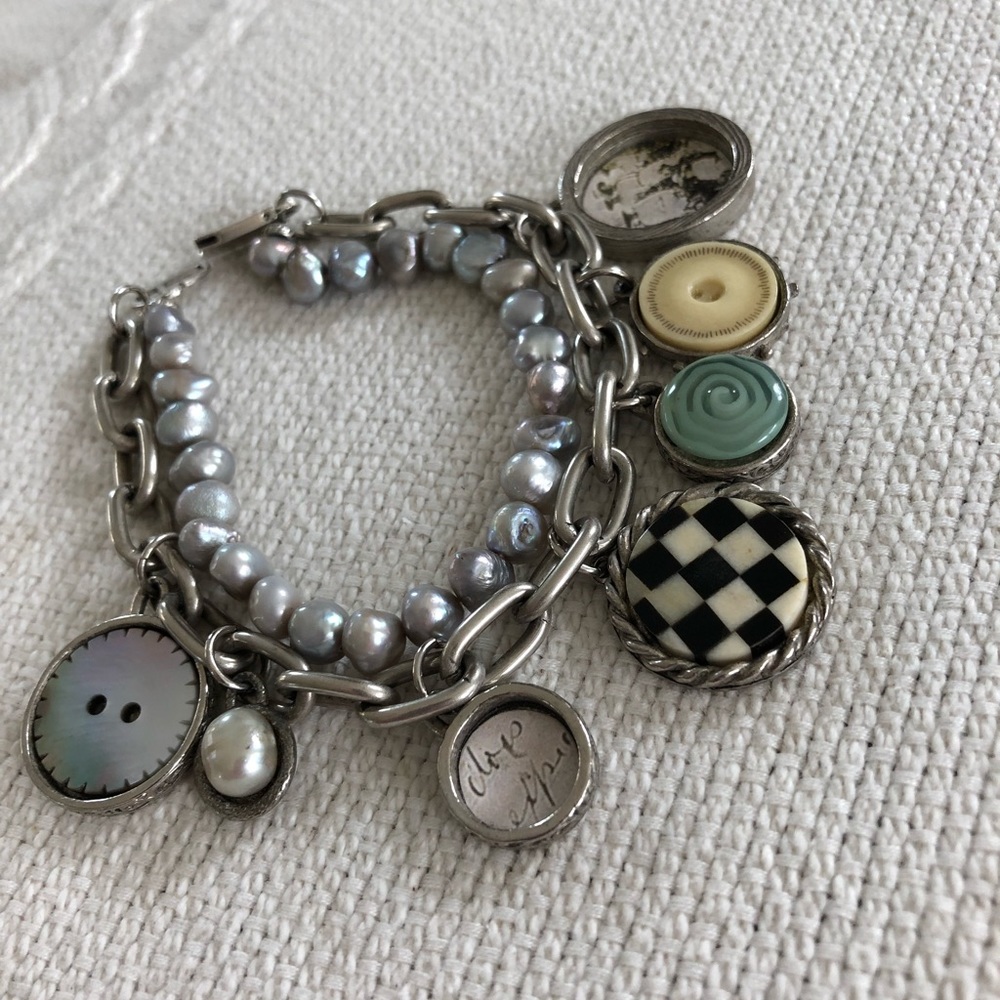 Charm bracelet with string of pearls